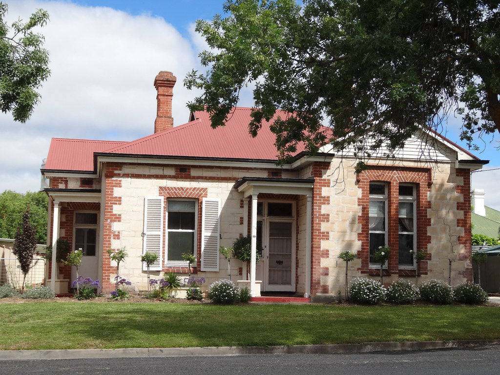 Quality residential roof construction showing architectural detail and proper installation